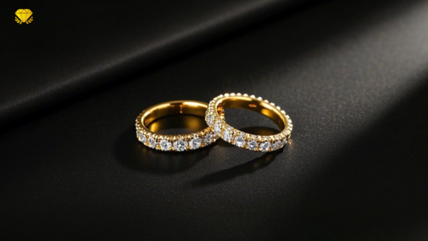 a pair of gold rings with diamonds